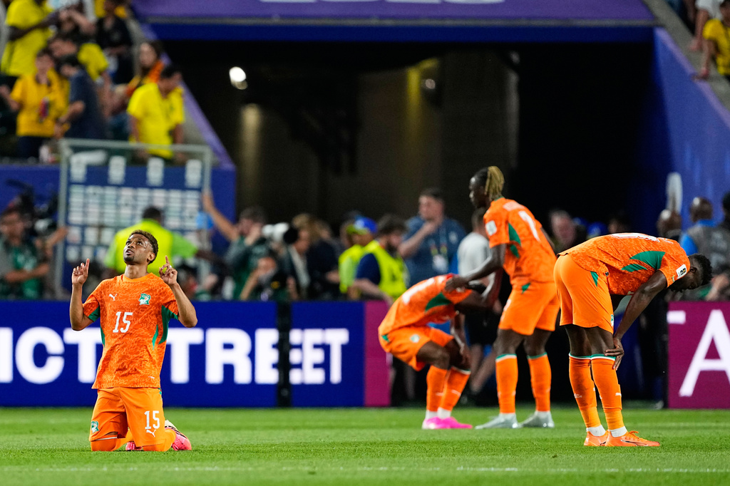 Ivory Coast's Amad Diallo (15) reacts with teammates following their World Cup Group E soccer match win over Ecuador in Philadelphia, Sunday, June 14, 2026. (AP Photo/Petr David Josek)