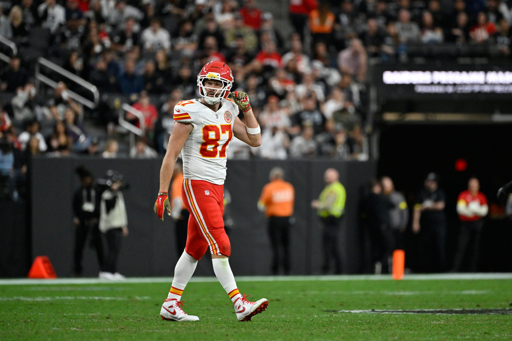 Kansas City Chiefs tight end Travis Kelce (87) heads off the field following the final play of the first half of an NFL football game against the Las Vegas Raiders Sunday, Jan. 4, 2026, in Las Vegas. (AP Photo/David Becker)