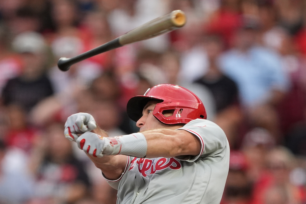 Philadelphia Phillies J.T. Realmuto loses control of his bat during the fourth inning of a baseball game against the Cincinnati Reds in Cincinnati, Wednesday, July 8, 2026. (AP Photo/Carolyn Kaster)