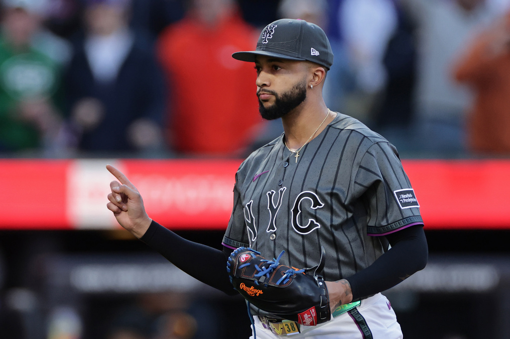 New York Mets pitcher Devin Williams reacts after the final out against the Miami Marlins during the ninth inning of a baseball game Saturday, May 30, 2026, in New York. (AP Photo/Adam Hunger)