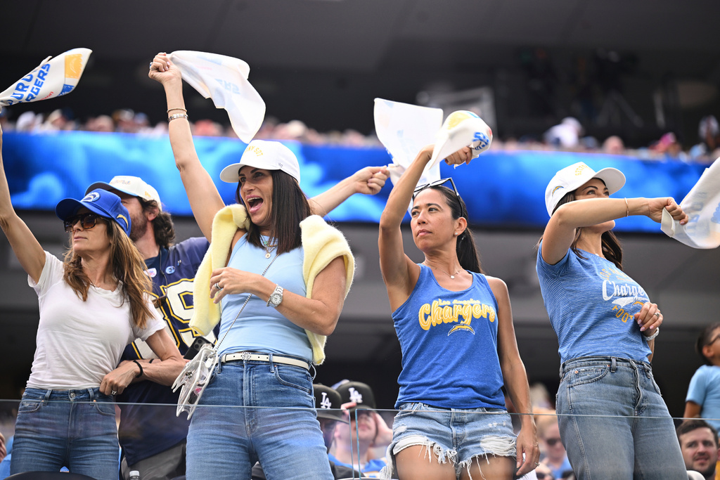 FILE - Fans cheer during an NFL football game between the Los Angeles Chargers and the Denver Broncos, Sunday, Sept. 21, 2025, in Inglewood, Calif. (AP Photo/Carrie Giordano, File)