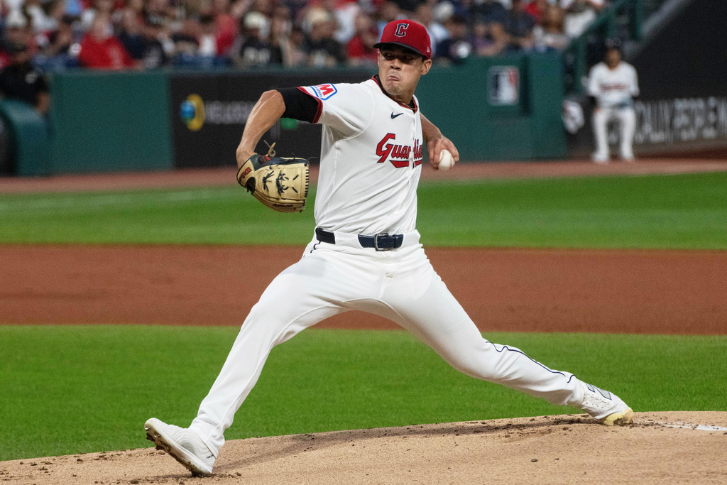 Cleveland Guardians starting pitcher Joey Cantillo delivers against the Texas Rangers during the first inning of a baseball game, Saturday, Sept. 27, 2025, in Cleveland. (AP Photo/Phil Long)