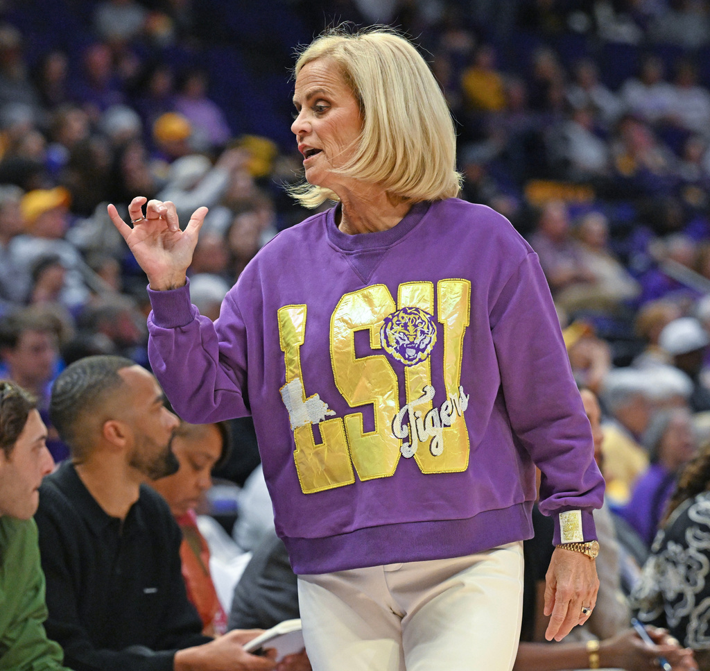LSU head coach Kim Mulkey coaches speaks at the team's bench in an NCAA women's basketball game against Houston Christian in Baton Rouge, La., Tuesday, Nov. 4, 2025. (Hilary Scheinuk/The Advocate via AP)