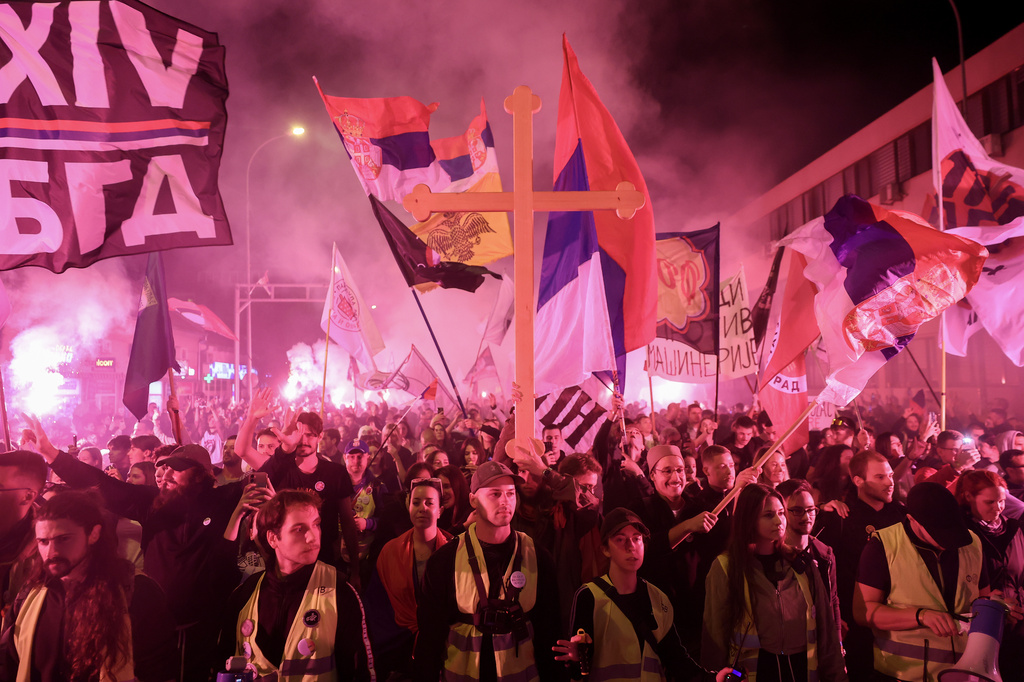 Students and anti-government protesters march to Novi Sad for a rally on Nov. 1 marking the first anniversary of a train station disaster that killed 16 people, in Indjija, Serbia, Thursday, Oct. 30, 2025. (AP Photo/Armin Durgut)