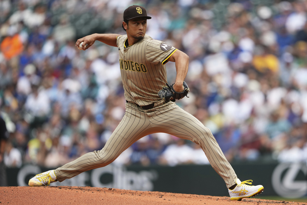 San Diego Padres starting pitcher Yu Darvish throws during the second inning of a baseball game against the Seattle Mariners Wednesday, Aug. 27, 2025 in Seattle. (AP Photo/Lindsey Wasson)
