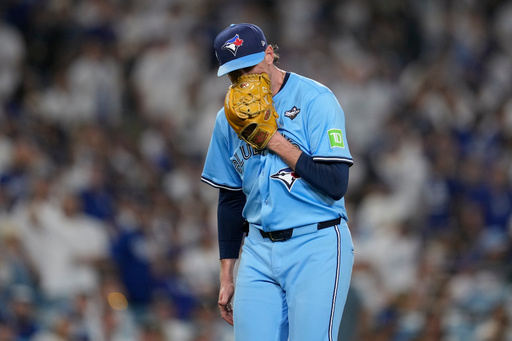 Toronto Blue Jays' pitcher Shane Bieber yells in his glove as he leaves the game during the sixth inning in Game 4 of baseball's World Series against the Los Angeles Dodgers, Tuesday, Oct. 28, 2025, in Los Angeles. (AP Photo/Ashley Landis) Toronto Blue Jays' pitcher Shane Bieber yells in his glove as he leaves the game during the sixth inning in Game 4 of baseball's World Series against the Los Angeles Dodgers, Tuesday, Oct. 28, 2025, in Los Angeles. (AP Photo/Ashley Landis)