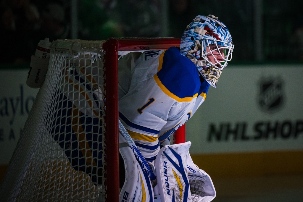 Buffalo Sabres goaltender Ukko-Pekka Luukkonen (1) warms up before an NHL hockey game against the Dallas Stars, Wednesday, Dec. 31, 2025, Dallas. (AP Photo/Jessica Tobias)