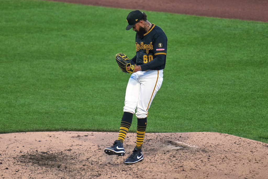 Pittsburgh Pirates pitcher Dennis Santana collects himself in the mound during the eighth inning of a baseball game against the Atlanta Braves in Pittsburgh, Wednesday, July 8, 2026. (AP Photo/Gene J. Puskar)