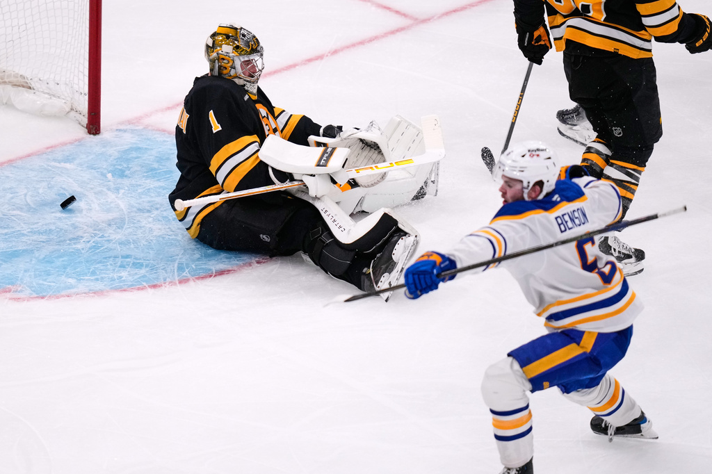 Boston Bruins goaltender Jeremy Swayman (1) sits on the ice after giving up a goal to Buffalo Sabres left wing Zach Benson (6) during the third period in Game 6 of a first-round NHL hockey Stanley Cup playoff series, Friday, May 1, 2026, in Boston. (AP Photo/Charles Krupa)
