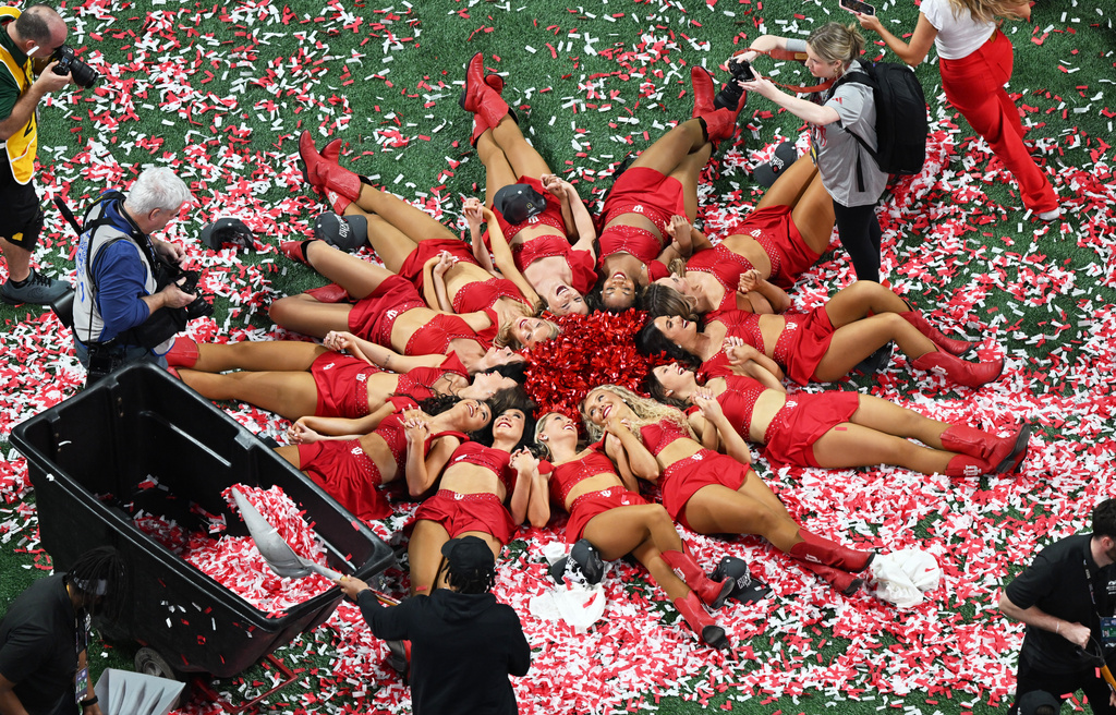 Indiana cheerleaders celebrate after the Peach Bowl NCAA college football playoff semifinal against Oregon, Friday, Jan. 9, 2026, in Atlanta. (AP Photo/Danny Karnik)