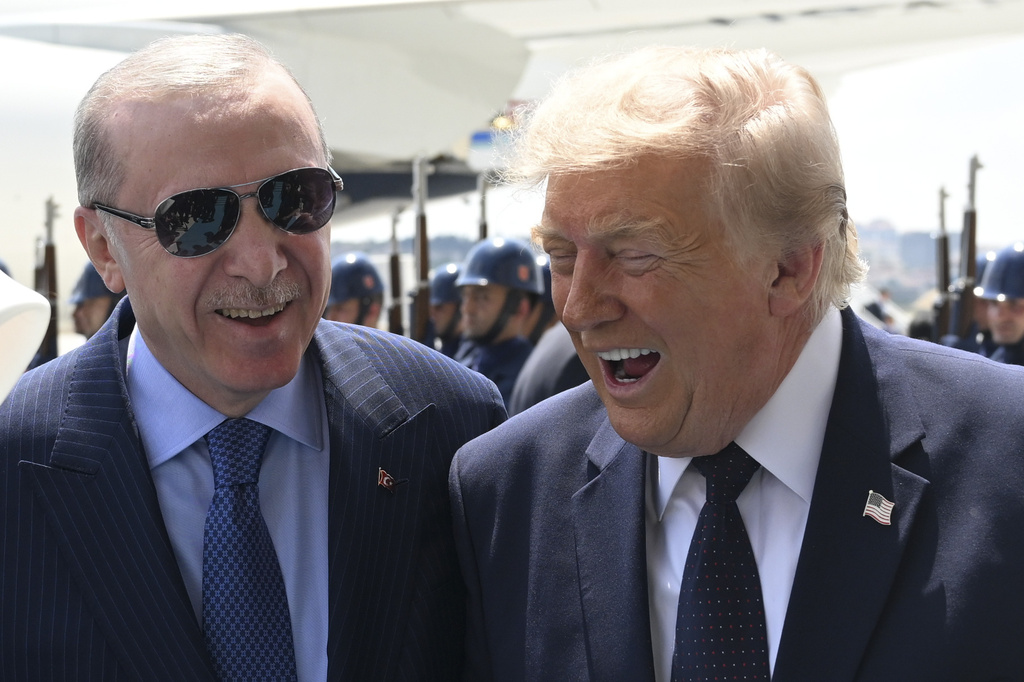 President Donald Trump, right, speaks with Turkish President Recep Tayyip Erdogan as he arrives for the NATO summit in Ankara, Turkey, Tuesday, July 7, 2026. (Doğukan Keskinkılıç, Pool Photo via AP)