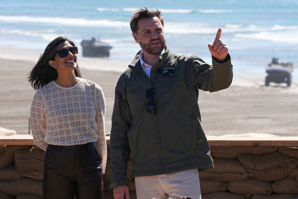 FILE - Vice President JD Vance, right, and second lady Usha Vance watch a demonstration by Marines during activities to mark the upcoming Marine Corps' 250th anniversary Saturday, Oct 18, 2025, on Marine Corps Base Camp Pendleton in Camp Pendleton, Calif. (AP Photo/Gregory Bull, File)
