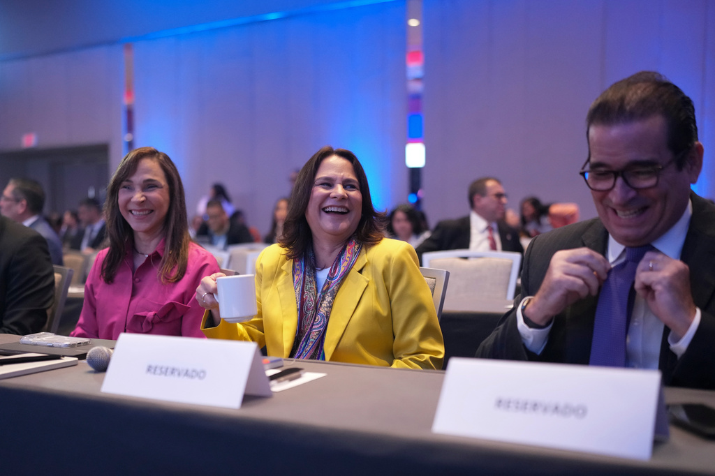 Incoming Panama Canal Administrator Ilya Espino de Marotta, center, attends an international financial summit in Panama City, Friday, Sept. 4, 2026. (AP Photo/Matias Delacroix)