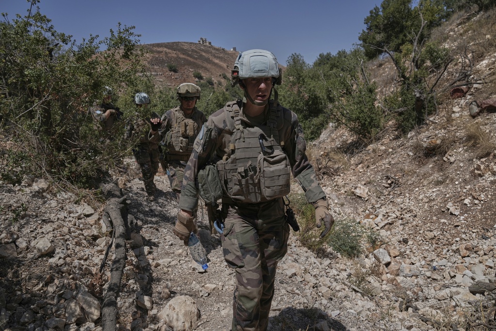 French U.N. peacekeepers patrol the Saluki Valley in south Lebanon as they search for Hezbollah weapons, Wednesday, Aug. 20, 2025. (AP Photo/Hussein Malla)