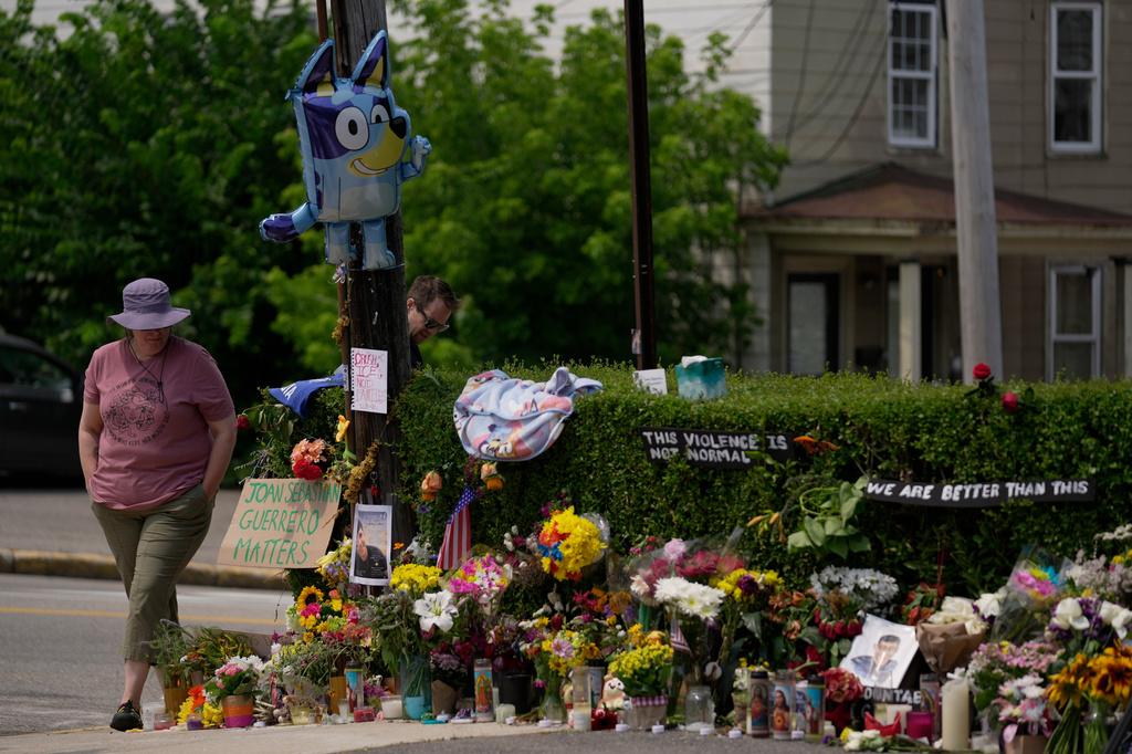 FILE - A woman visits a makeshift memorial for Johan Sebastián Durán Guerrero, who was killed by U.S. Immigration and Customs Enforcement, in Biddeford, Maine, July 15, 2026, (AP Photo/Robert F. Bukaty, File)