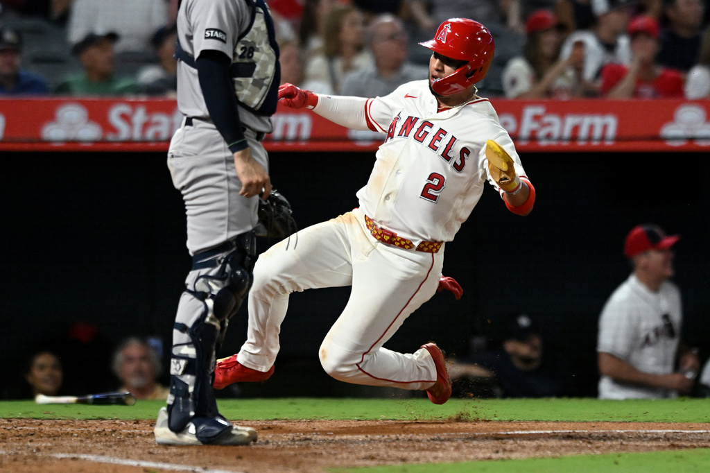 Los Angeles Angels' Oswald Peraza (2) scores against the New York Yankees in the fourth inning of a baseball game Monday, Aug. 31, 2026, in Anaheim, Calif. (AP Photo/Wally Skalij)