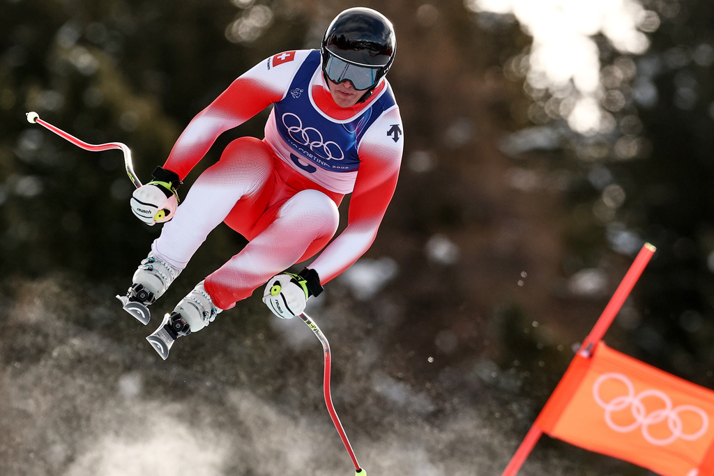 Switzerland's Franjo von Allmen speeds down the course during an alpine ski, men's downhill race, at the 2026 Winter Olympics, in Bormio, Italy, Saturday, Feb. 7, 2026. (AP Photo/Gabriele Facciotti)