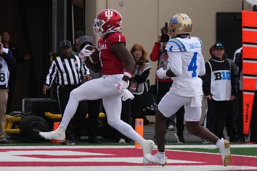 Indiana running back Roman Hemby (1) runs past UCLA defensive back Key Lawrence (4) for a touchdown during the first half of an NCAA college football game, Saturday, Oct. 25, 2025, in Bloomington, Ind. (AP Photo/Darron Cummings) Indiana running back Roman Hemby (1) runs past UCLA defensive back Key Lawrence (4) for a touchdown during the first half of an NCAA college football game, Saturday, Oct. 25, 2025, in Bloomington, Ind. (AP Photo/Darron Cummings)
