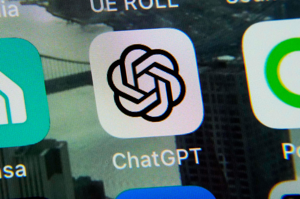 FILE - The ChatGPT app is displayed on an iPhone in New York, May 18, 2023. (AP Photo/Richard Drew, File)