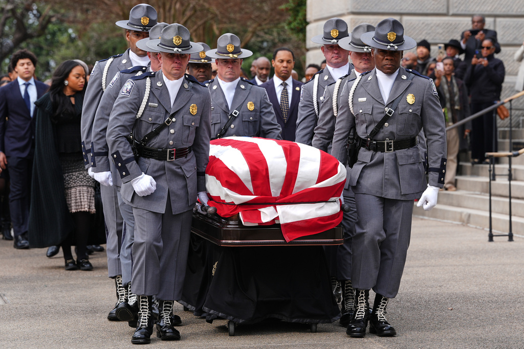 The casket of the Rev. Jesse Jackson is carried to the South Carolina Statehouse, where he will lie in state, Monday, March 2, 2026, in Columbia, S.C. (AP Photo/Matt Kelley, Pool)