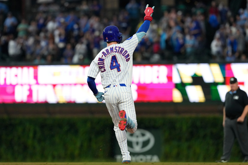 Chicago Cubs' Pete Crow-Armstrong celebrates as he rounds the bases after hitting a solo home run during the first inning of a baseball game against the Cincinnati Reds in Chicago, Sunday, Aug. 30, 2026. (AP Photo/Nam Y. Huh)
