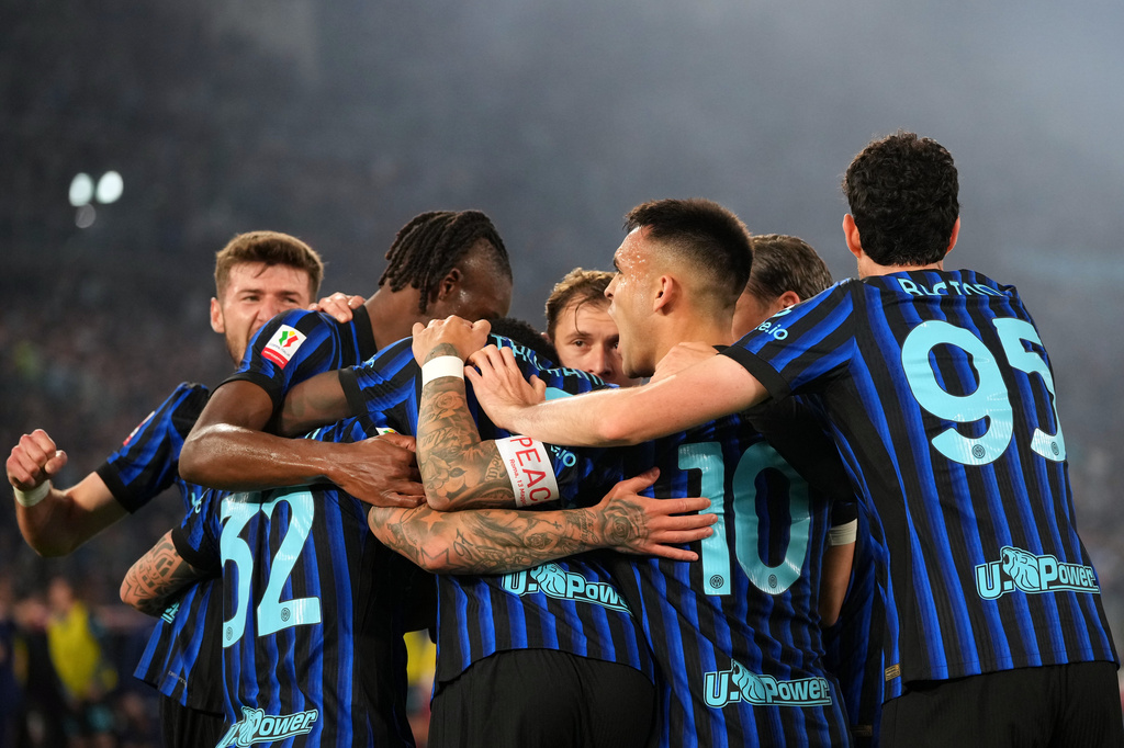 Inter Milan players celebrate after Lazio's Adam Marusic scored an own goal during the Italian Cup soccer final between Lazio and Inter Milan, in Rome, Wednesday, May 13, 2026. (AP Photo/Andrew Medichini)