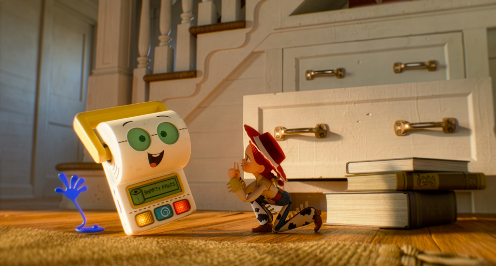FILE - This image released by Disney shows Smarty Pants, voiced by Conan O'Brien, and Jessie, voiced by Joan Cusack, right, in a scene from "Toy Story 5." (Pixar/Disney via AP)