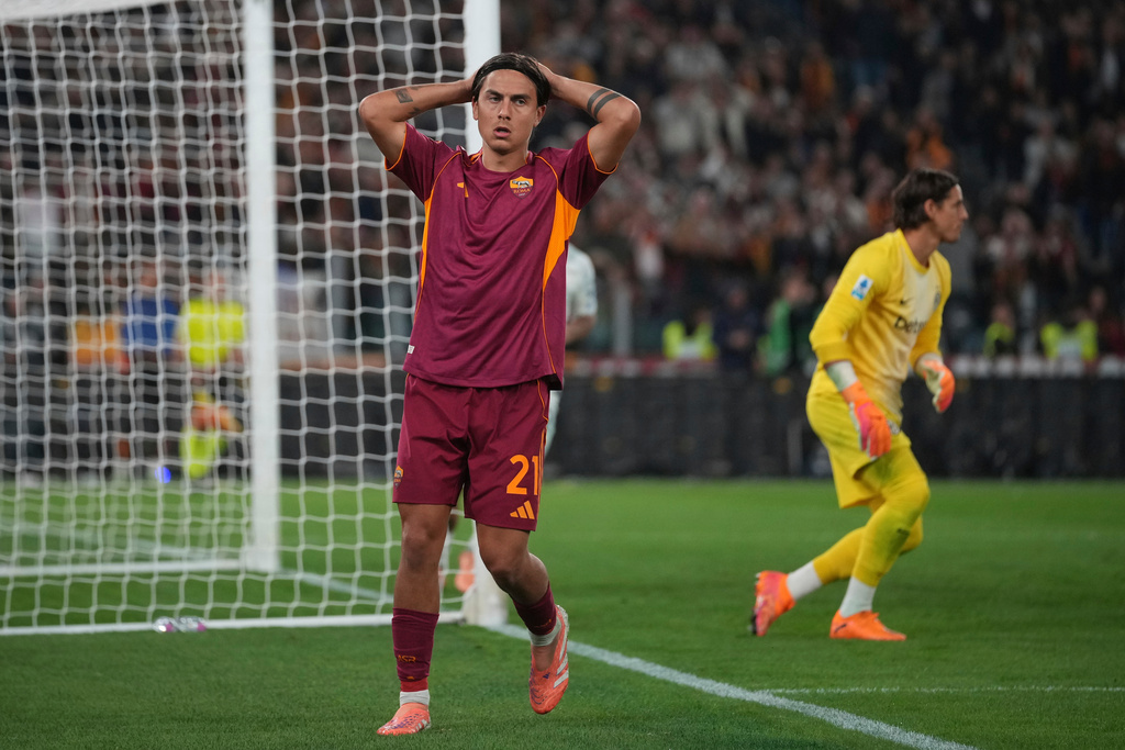 Roma's Paulo Dybala gestures after missing a scoring chance during a Serie A soccer match between Roma and Inter Milan, in Rome, Saturday, Oct. 18, 2025. (AP Photo/Andrew Medichini)
