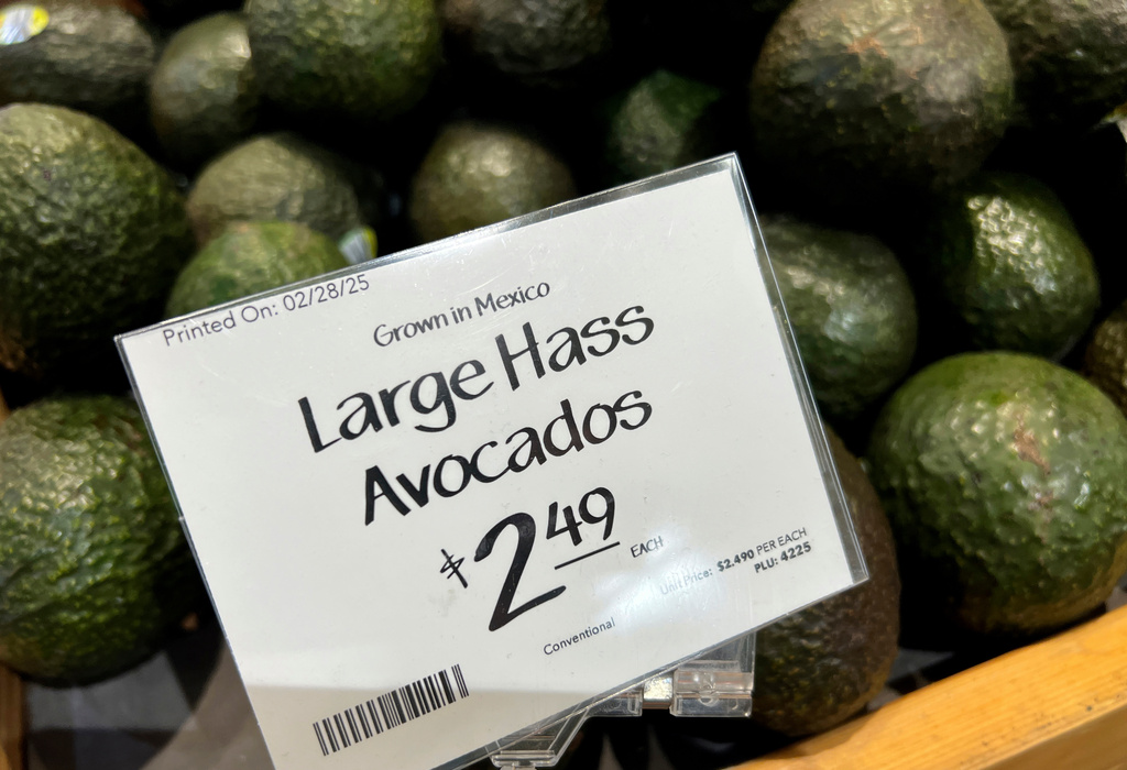 FILE - Avocados imported from Mexico are for sale in a supermarket in Miami as the United States imposed 25% tariffs on goods from Canada and Mexico, starting a trade war with its closest neighbors and allies Wednesday, Mar. 5, 2025. (AP Photo/Lynne Sladky, file)