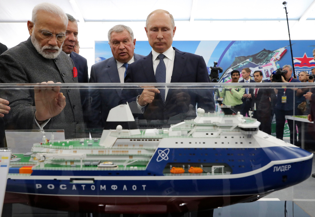 FILE - Russian President Vladimir Putin, right, and Indian Prime Minister Narendra Modi, left, look at a model of a Leader nuclear-powered icebreaker as they visit the Zvezda shipyard in the town of Bolshoi Kamen, Russia, on Sept. 4, 2019. (Mikhail Klimentyev, Sputnik, Kremlin Pool Photo via AP, File)