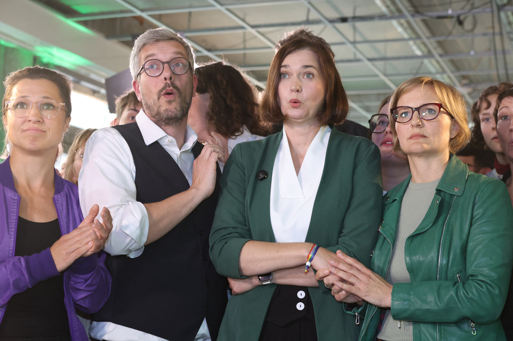 From right, Franziska Brantner, Federal Chair of Alliance 90/The Greens; Claudia Müller (Alliance 90/The Greens), the Greens' lead candidate in Mecklenburg-Western Pomerania and a member of the Bundestag; and Ole Krueger (Alliance 90/The Greens), state chair of Alliance 90/The Greens in Mecklenburg-Western Pomerania, react to the projections for the state election at their party's election party at the tisch coworking space, in Schwerin, Germany, Sunday, Sept. 20, 2026. (Ulrich Perrey/dpa via AP)