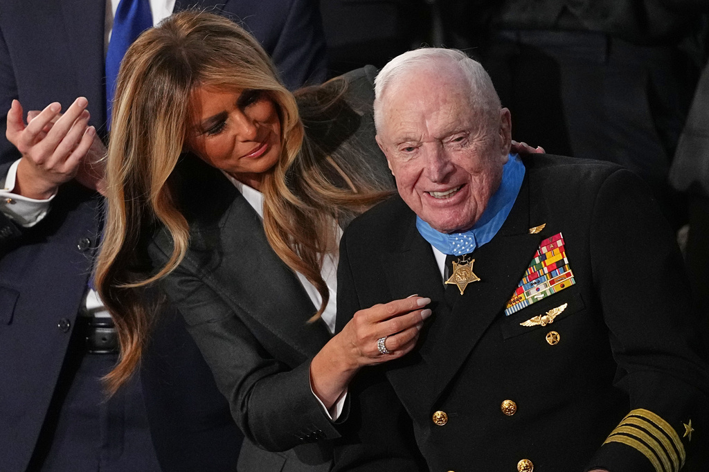 First lady Melania Trump presents the Congressional Medal of Honor to World War II Navy pilot Capt. Royce Williams as President Donald Trump delivers the State of the Union address to a joint session of Congress in the House chamber at the U.S. Capitol in Washington, Tuesday, Feb. 24, 2026. (AP Photo/Matt Rourke)