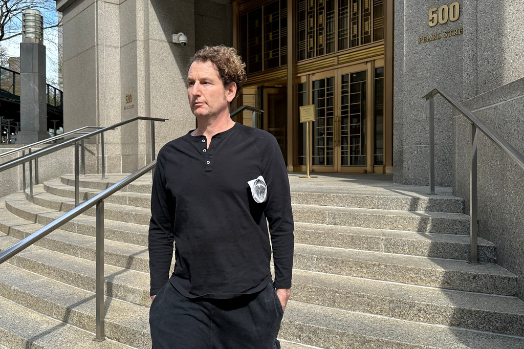 Stefan Pildes leaves Manhattan federal court in New York on Wednesday, April 15, 2026, after he was charged with wire fraud for allegedly cheating participants in SantaCon in New York City who thought their money was all going to charity. (AP Photo/Larry Neumeister)
