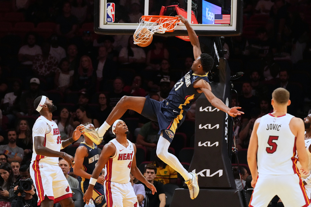 New Orleans Pelicans center Yves Missi (21) dunks the ball during the second half of an NBA preseason basketball game against the Miami Heat Thursday, Oct. 8, 2026, in Miami. (AP Photo/Marta Lavandier)