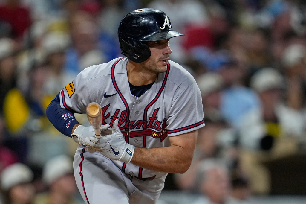 Atlanta Braves' Matt Olson watches his hit for a single during the sixth inning of a baseball game against the San Diego Padres Monday, June 22, 2026, in San Diego. (AP Photo/Gregory Bull)