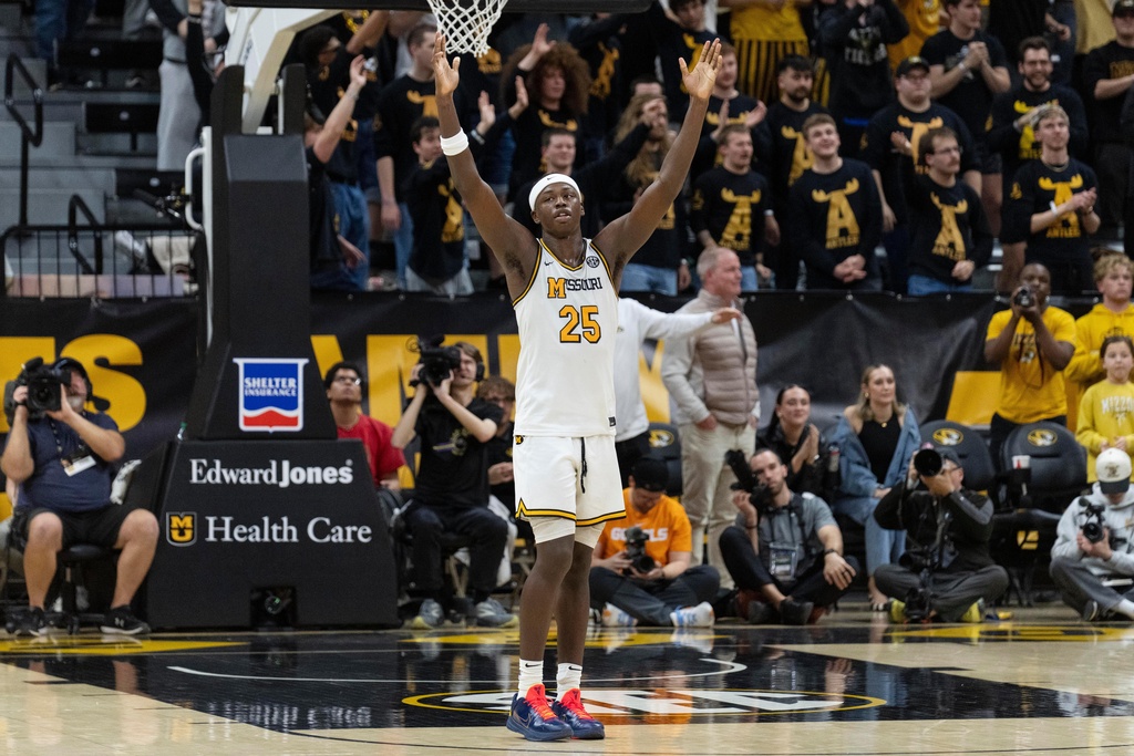 Missouri's Mark Mitchell (25) celebrates during the final minute of their victory over Tennessee during the second half of an NCAA basketball game Tuesday, Feb. 24, 2026, in Columbia, Mo. (AP Photo/L.G. Patterson)