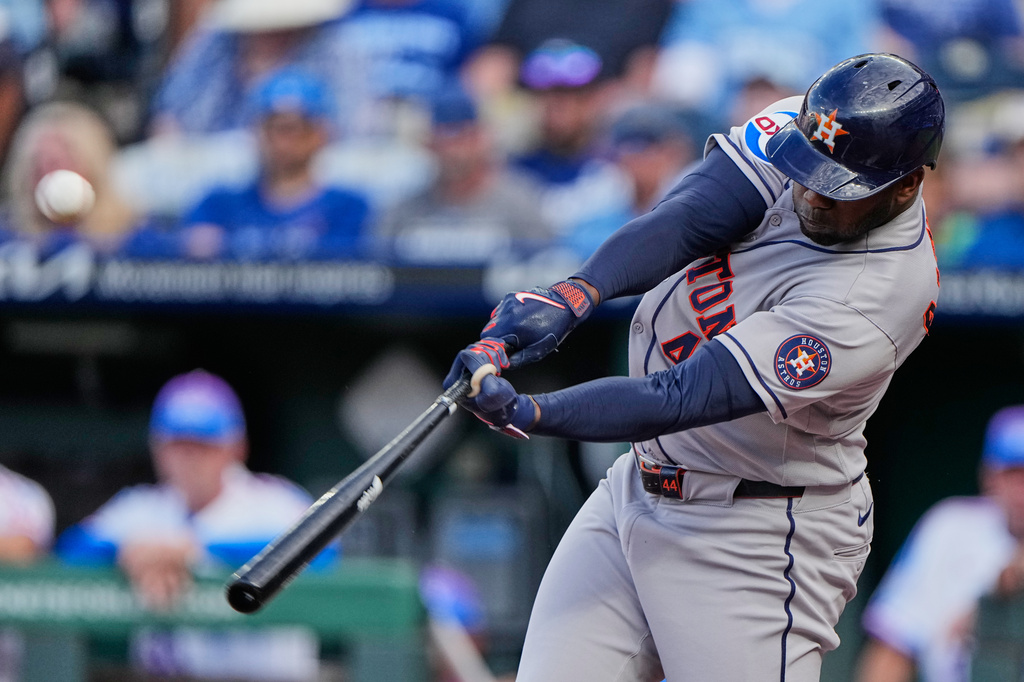 Houston Astros' Yordan Alvarez hits a two-run home run hit during the first inning of a baseball game against the Kansas City Royals, Friday, June 12, 2026, in Kansas City, Mo. (AP Photo/Charlie Riedel)
