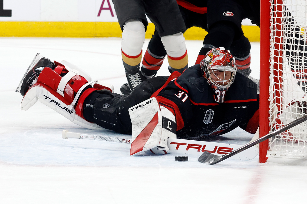 Carolina Hurricanes goaltender Frederik Andersen (31) stops the puck during the third period in Game 2 of the NHL hockey Stanley Cup Final series against the Vegas Golden Knights in Raleigh, N.C., Thursday, June 4, 2026. (AP Photo/Karl DeBlaker)