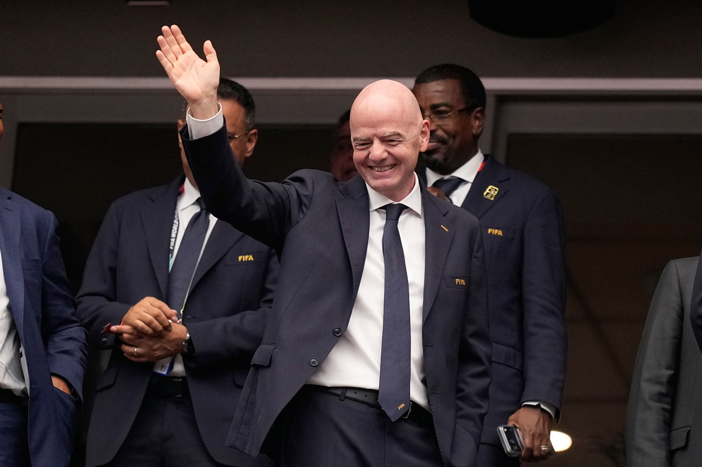 FIFA President Gianni Infantino waves ahead of the World Cup round of 16 soccer match between Canada and Morocco in Houston, Saturday, July 4, 2026. (AP Photo/Ashley Landis)