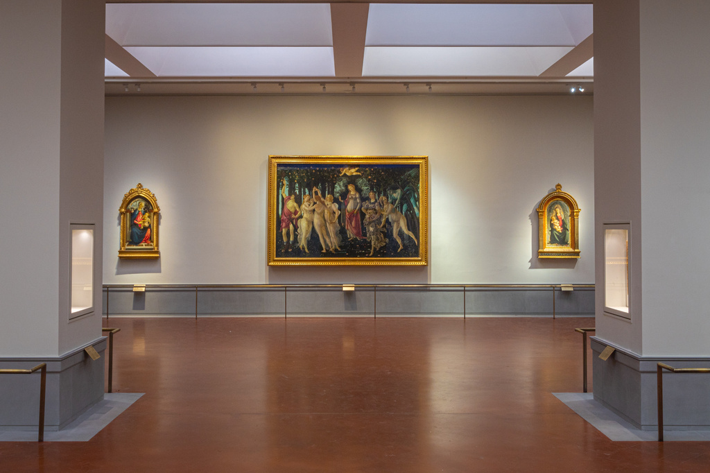 This picture made available Tuesday, June 16, 2026 shows a view of the renovated and refurbished Botticelli rooms, with Renaissance master Sandro Botticelli's paintings: "Spring ", center, "Madonna of the Rose Garden", left and "Madonna in glory with Seraphim" displayed at Florence's Uffizi Galleries, Italy. (Press Office of the Uffizi Gallery Museum via AP)
