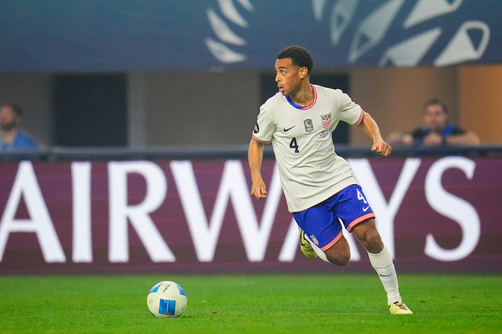 FILE - United States' Tyler Adams runs with the ball during a CONCACAF Nations League championship soccer match between Mexico and the United States, Sunday, March 24, 2024, in Arlington, Texas. (AP Photo/Julio Cortez, File)