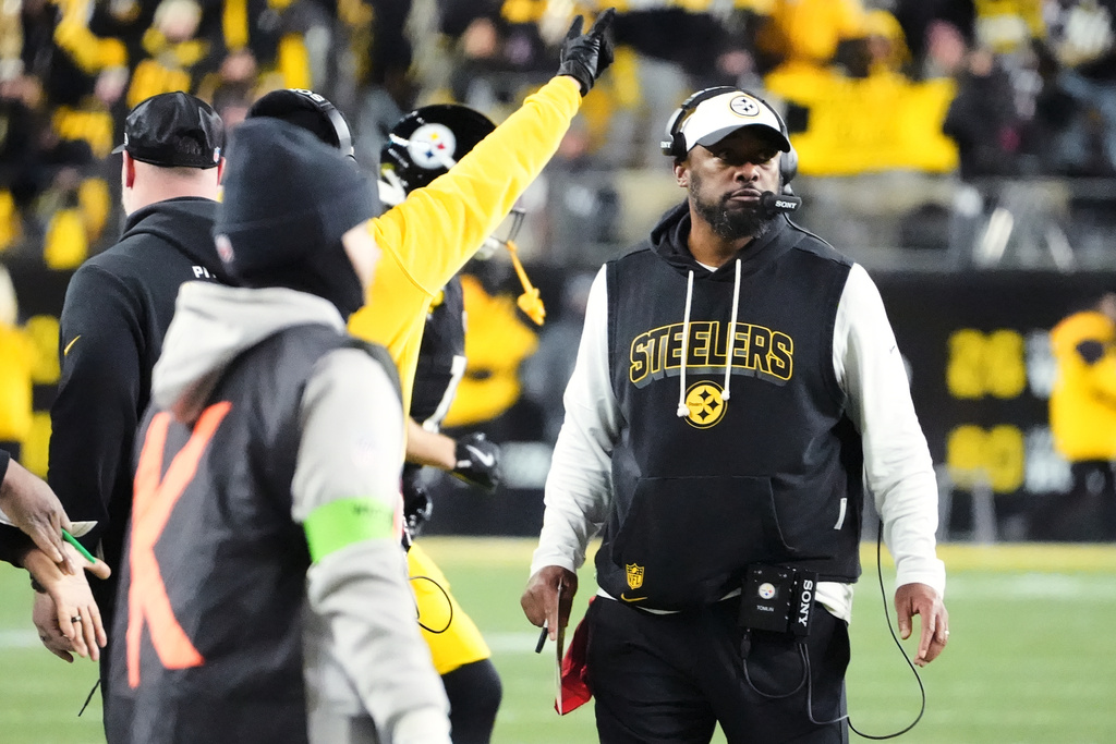 Pittsburgh Steelers head coach Mike Tomlin, right, stands on the sideline during the first half of NFL wild-card playoff football game against the Houston Texans, Monday, Jan. 12, 2026, in Pittsburgh. (AP Photo/Gene J. Puskar)