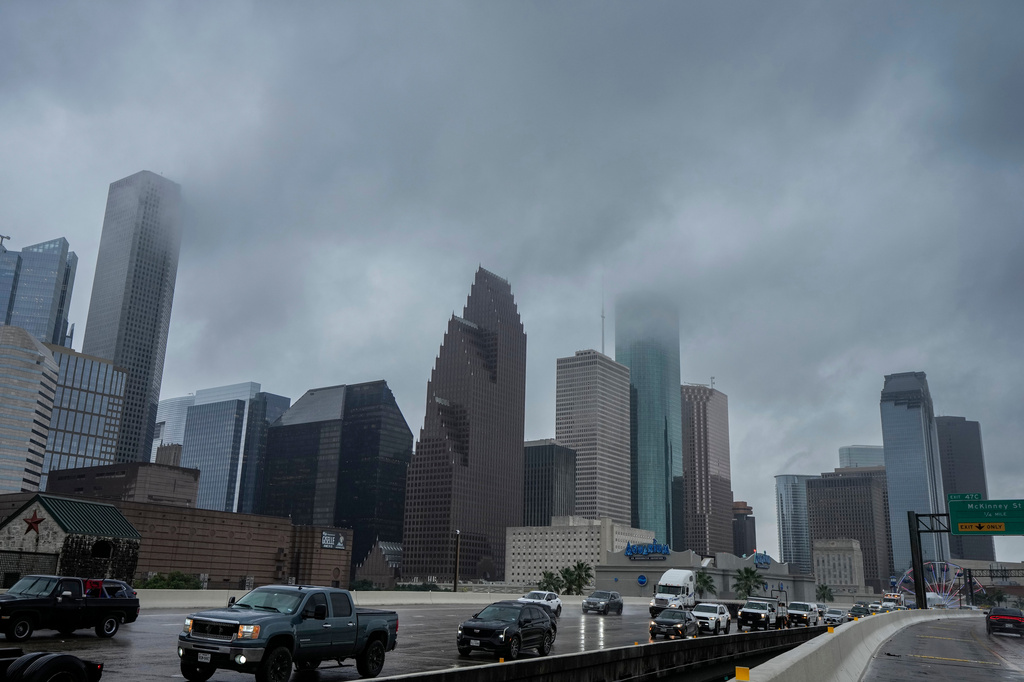 Low clouds hang over downtown produced by tropical weather in the Gulf of Mexico in Houston, Wednesday, June 17, 2026. 9Brett Coomer/Houston Chronicle via AP)