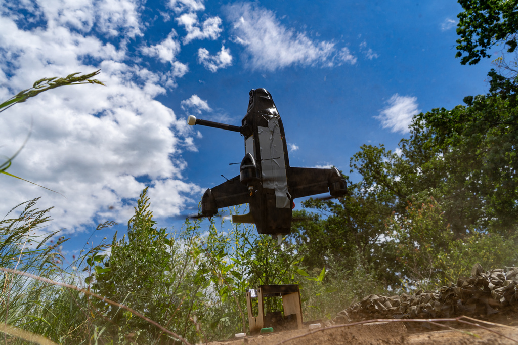 A Ukrainian interceptor drone is launched near Kharkiv, Ukraine, Friday, June 26, 2026. (AP Photo/Andrii Marienko)