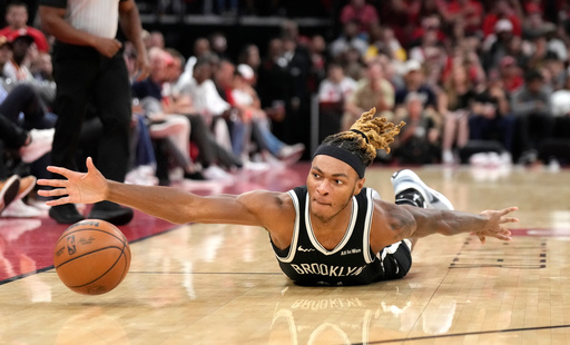 Brooklyn Nets forward Noah Clowney chases the ball during the first half of an NBA basketball game against the Houston Rockets, Monday, Oct. 27, 2025, in Houston. (AP Photo/Karen Warren) Brooklyn Nets forward Noah Clowney chases the ball during the first half of an NBA basketball game against the Houston Rockets, Monday, Oct. 27, 2025, in Houston. (AP Photo/Karen Warren)