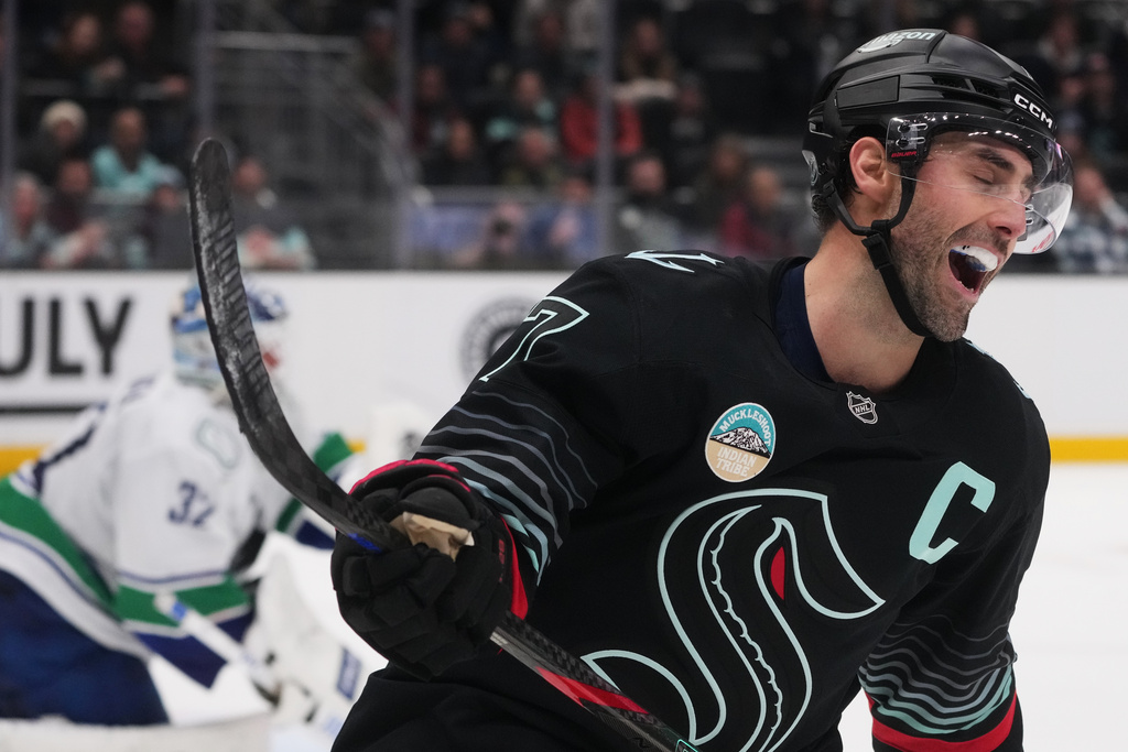 Seattle Kraken right wing Jordan Eberle reacts after his shot was blocked by Vancouver Canucks goaltender Kevin Lankinen during a shootout in an NHL hockey game Monday, Dec. 29, 2025, in Seattle. (AP Photo/Lindsey Wasson)