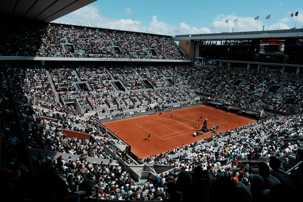 FILE - The crowd watch Norway's Casper Ruud playing against Spain's Rafael Nadal on the court Philippe Chatrier, known as center court, during their final match of the French Open tennis tournament at the Roland Garros stadium on June 5, 2022 in Paris. (AP Photo/Thibault Camus, File)