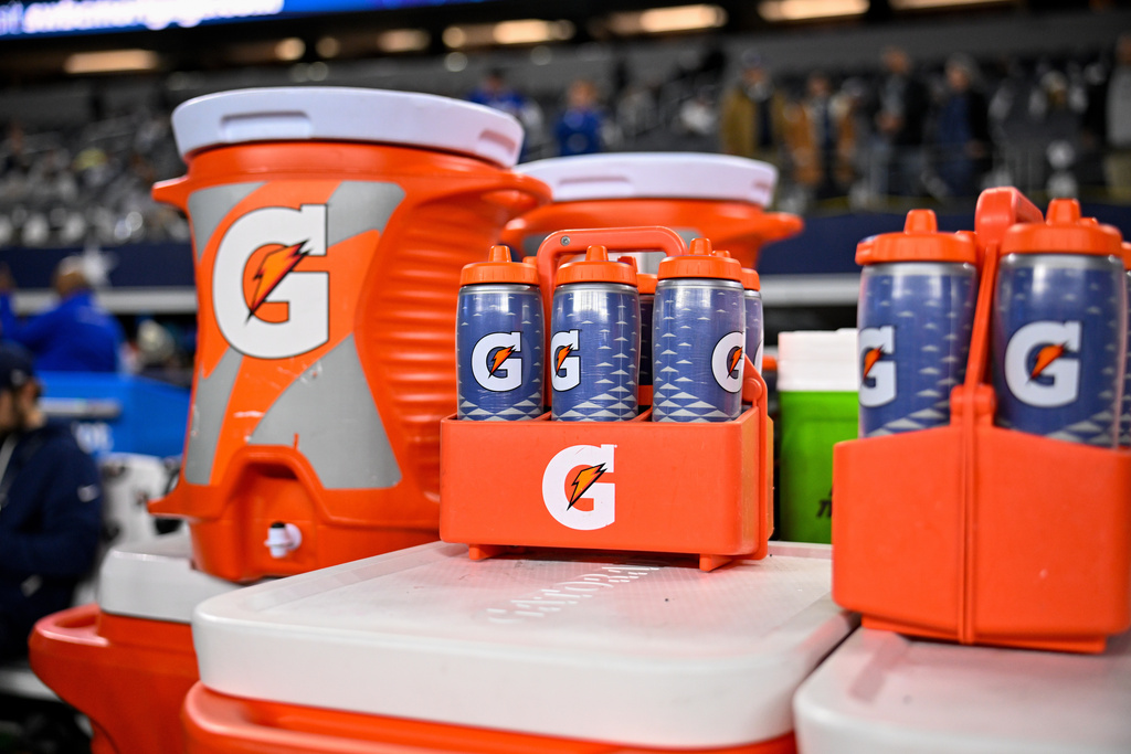 FILE - Gatorade bottles and coolers are seen on the sideline before an NFL football game between the Dallas Cowboys and the Minnesota Vikings, Dec. 14, 2025, in Arlington, Texas. (AP Photo/Jerome Miron, file)