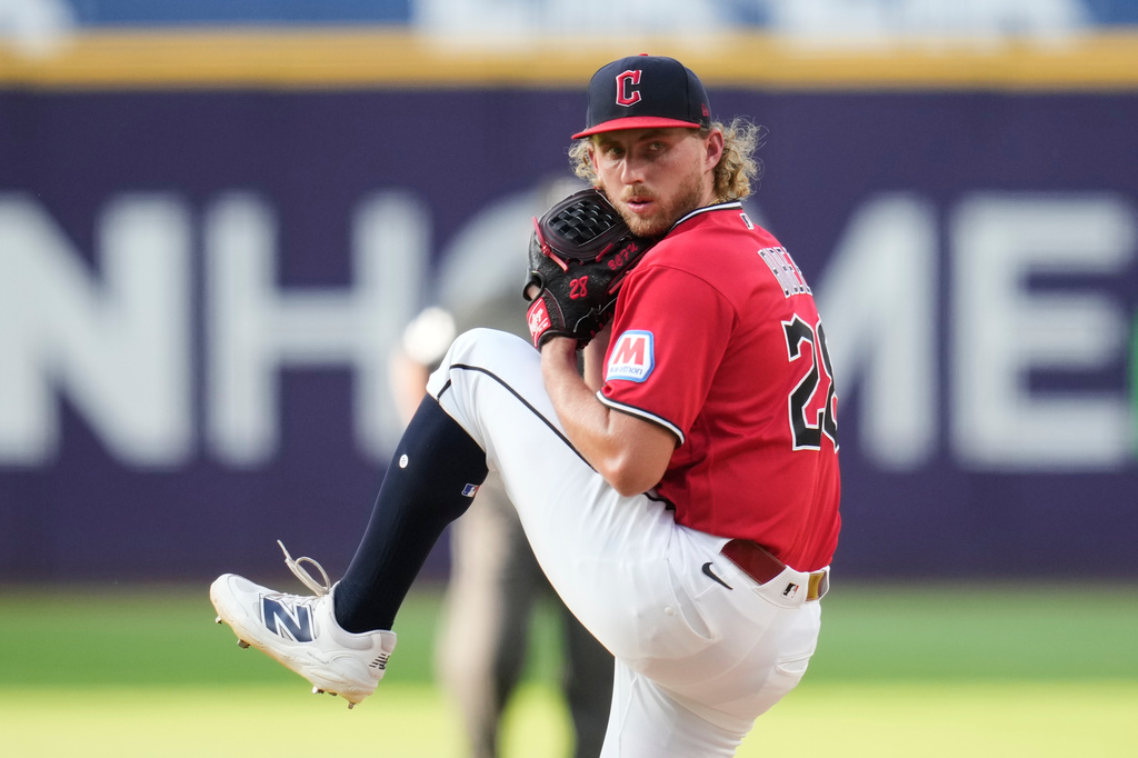 Cleveland Guardians' Tanner Bibee pitches in the second inning of a baseball game against the Texas Rangers in Cleveland, Tuesday, June 30, 2026. (AP Photo/Sue Ogrocki)