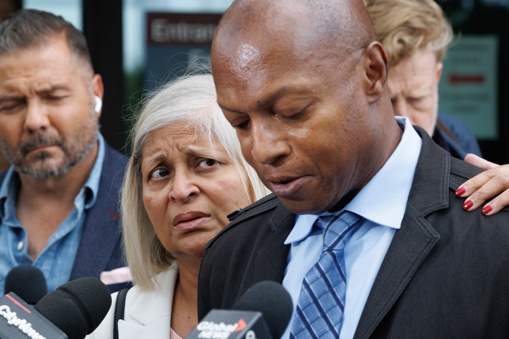 FILE - Stephen Mitchell, right, speaks to the media with Latha Mitchell outside the Ontario Court of Justice, May 29, 2026, in Newmarket, Ontario. (Christopher Drost/The Canadian Press via AP, File)